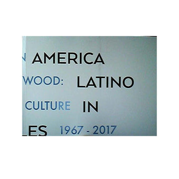 Book cover with text 'America Wood: Latino Culture in ES 1967-2017' on a light blue background